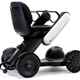 Wheels made of small rollers give the Whill Model Ci unprecedented maneuverability.